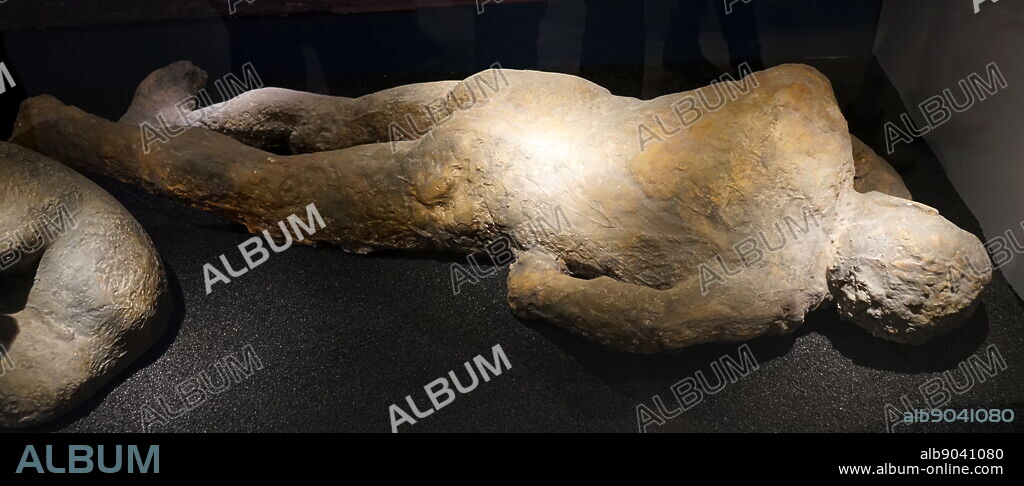 Pompeii casts caused when the pyroplastîc flow from the volcano of Mount Vesuvius, enveloped Pompeii in 70 AD. The inhabitants were buried. Ash solidified around their bodies. These casts reveal the positions people and animas took as they tried to protect themselves.