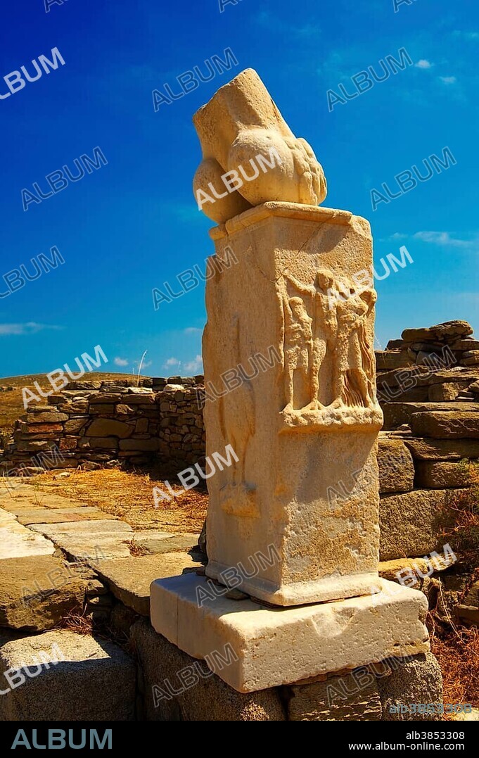Column with phallus at the Stoivadeion in the Temple of Dionysus, ruins of the Greek city of Delos, Delos Island, Cyclades, Greece, Europe.