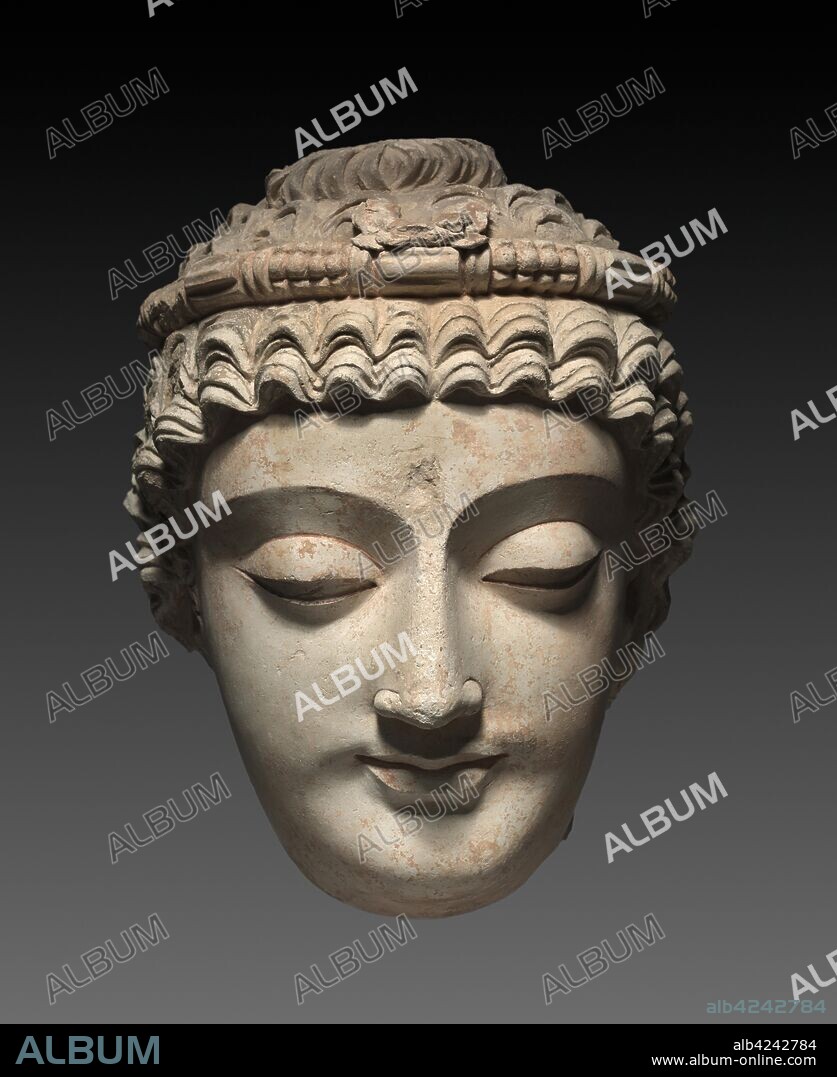 Head of Bodhisattva Avalokiteshvara, 300s-400s. Afghanistan or Pakistan, Gandhara, late Kushan Period (1st century-320). Stucco with traces of paint; overall: 45.7 x 35.5 cm (18 x 14 in.).