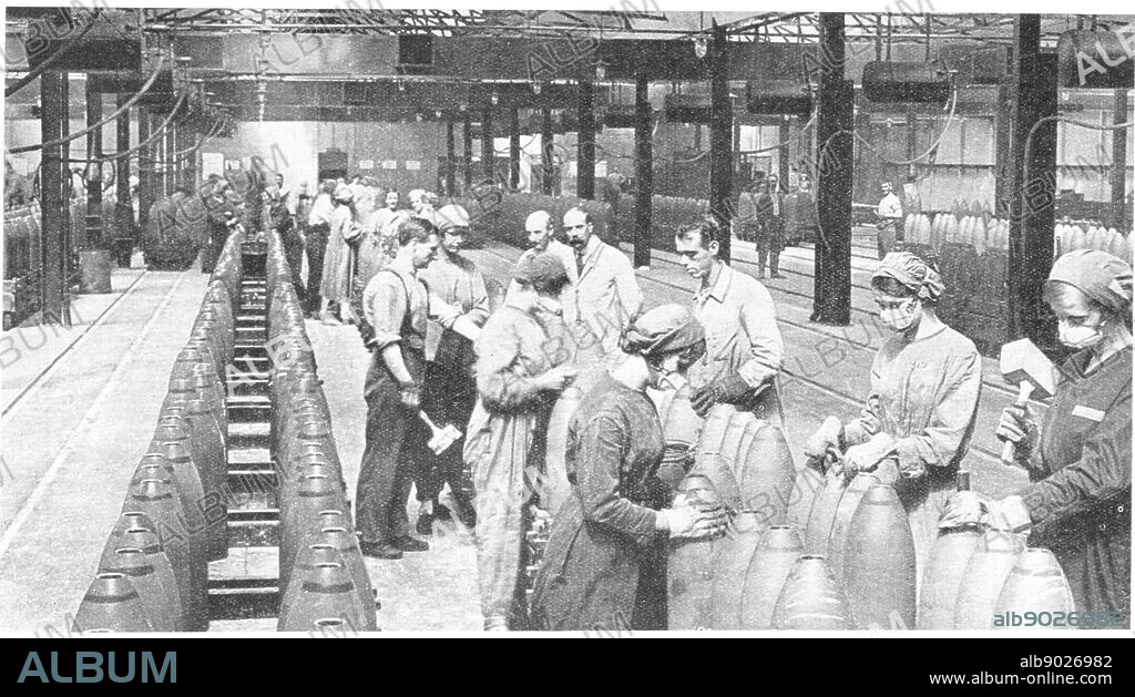 World War I - 1914-1918. After conscription in 1916, British women took over many civilian jobs. Girls filling shells in a munitions factory, wearing masks and gloves to stop inhalation and absorption of harmful chemicals.