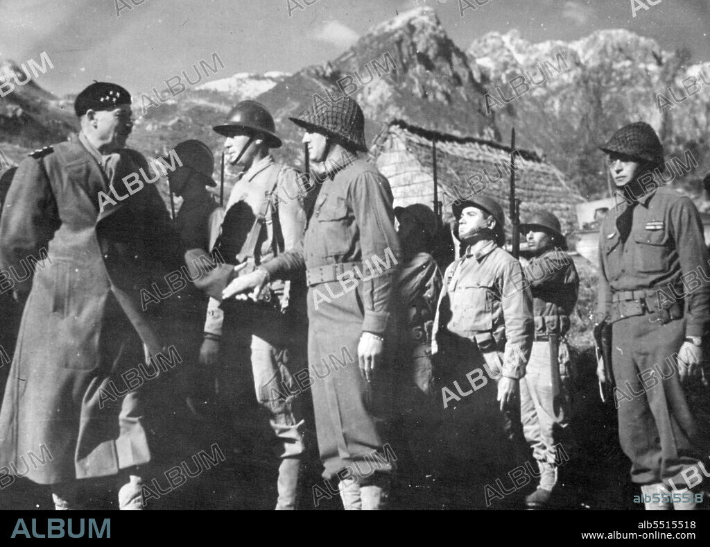 General Juin Visits French Troops On Italian Front General Alphonse-Pierre Juin (left), commander of the French Expeditionary Corps in Italy, reviews troops under his command, fighting with the Allied Fifth Army against the Germans, during an inspection tour of the Allied front in Western Italy. March 24, 1944.