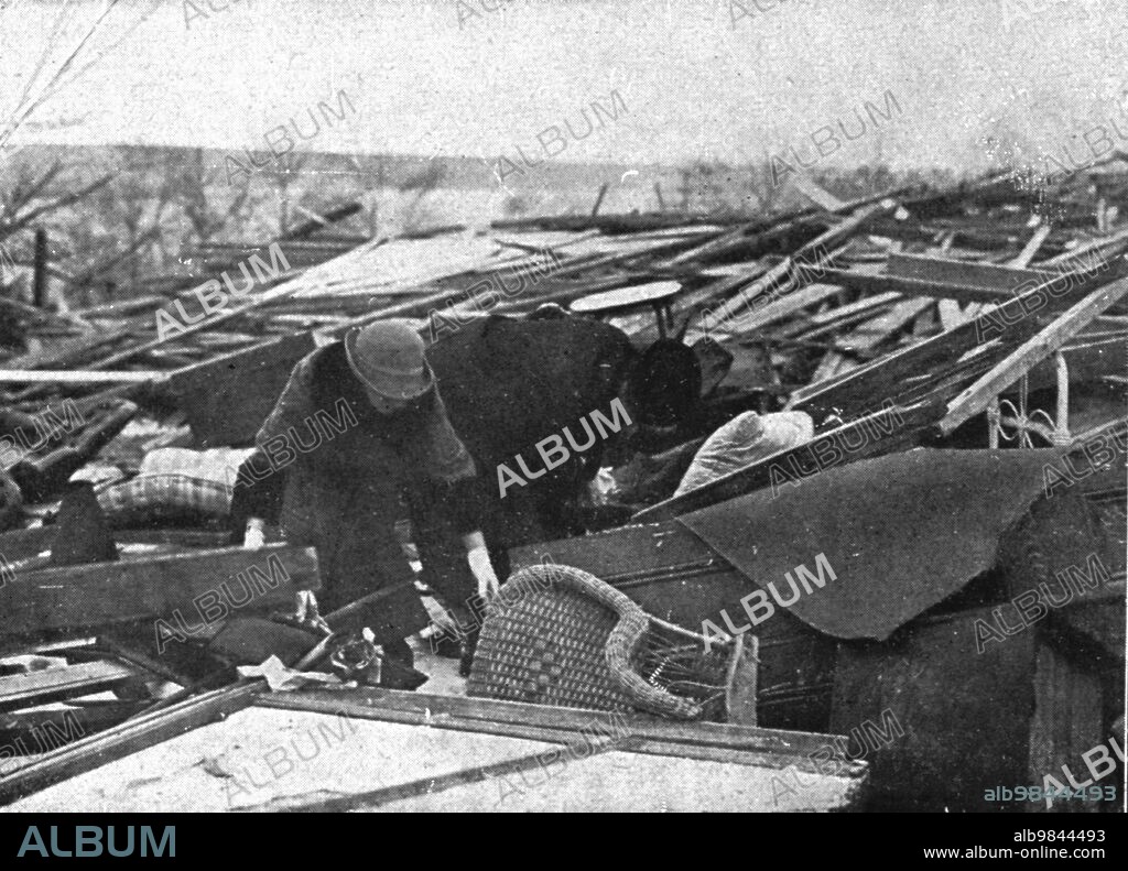 'In Canada: The Halifax Explosion; People search among the ruins of their houses', 1917. From "L'Album de la Guerre 1914-1919, Volume 2" [L'Illustration, Paris, 1924].