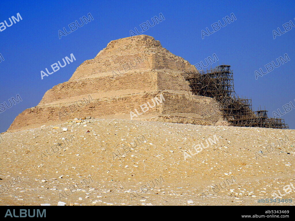 Pyramid of Djoser (Zoser), or step pyramid, in the Saqqara necropolis, Egypt, northwest of the city of Memphis. It was built during the 27th century BC for the burial of Pharaoh Djoser by his vizier, Imhotep. It is the central feature of a vast mortuary complex in an enormous courtyard surrounded by ceremonial structures and decoration..