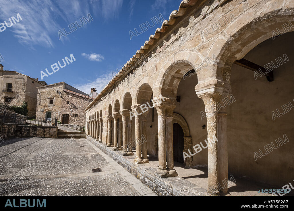 arcaded gallery of semicircular arches on paired columns, Church of the Savior, 13th century rural Romanesque, Carabias, Guadalajara, Spain.