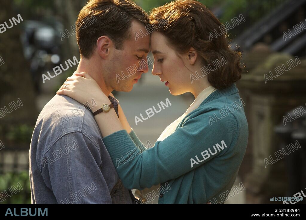 EMORY COHEN and SAOIRSE RONAN in BROOKLYN, 2015, directed by JOHN CROWLEY. Copyright WILDGAZE FILMS.