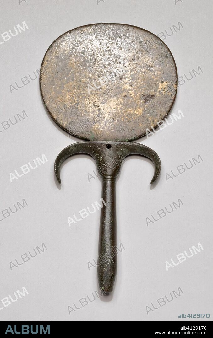 ANCIENT EGYPTIAN. Hand Mirror. Egyptian. Date: 1550 BC-1070 BC. Dimensions: 20 × 10.3 × 2.2 cm (7 7/8 × 4 1/16 × 7/8 in.). Copper alloy. Origin: Egypt.