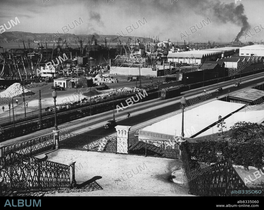 Portuguese Views -- The Port of Lisbon - Lisbon, situated near the mouth of the River Tagus, has a population of 784,000. February 29, 1955. (Photo by Paul Almasy, Camera Press).