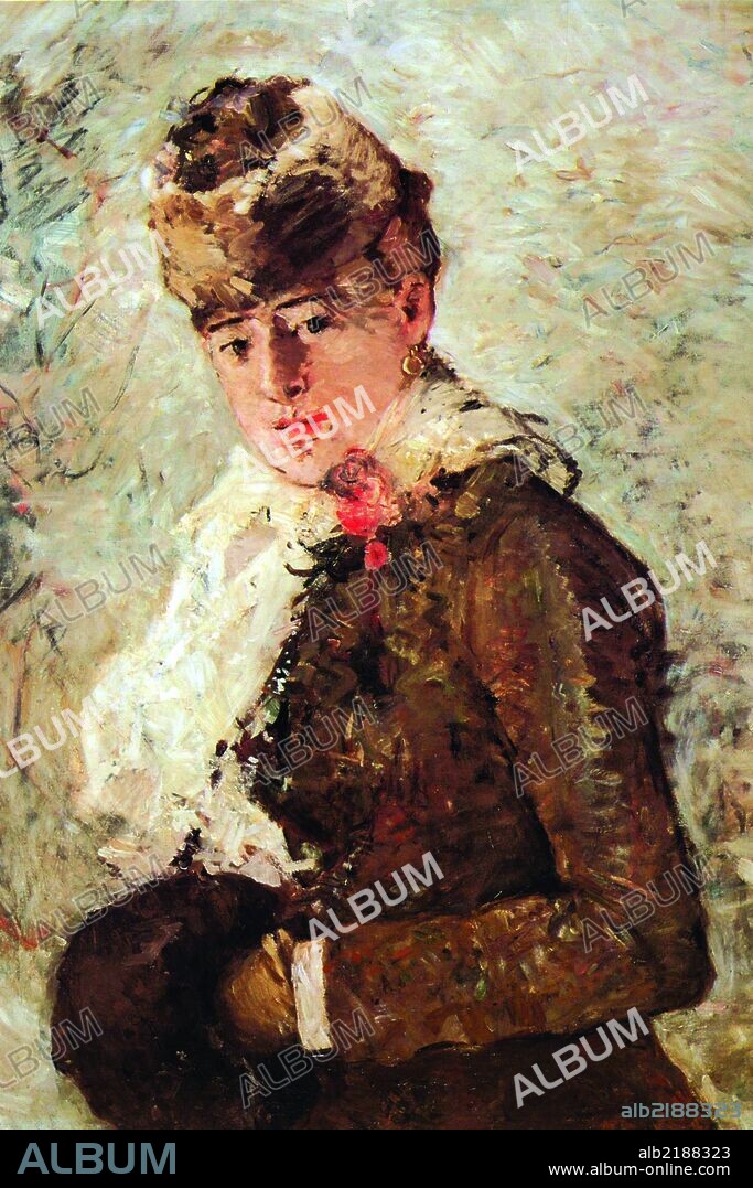Woman with hand muff, fur cap and winter coat.