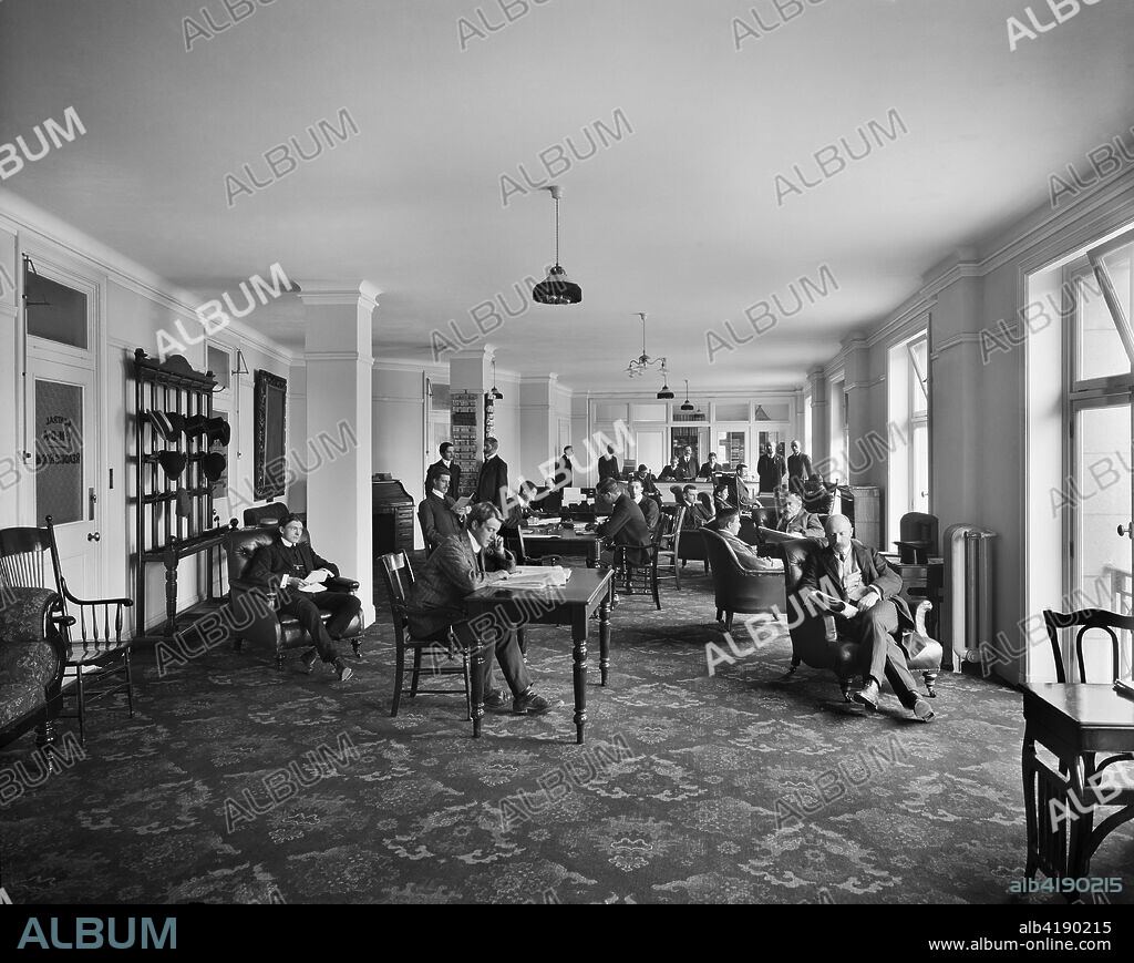 YMCA reading room, Exeter Hall, Strand, London, 1907. An interior view of the reading room in the YMCA's headquarters. The site of Exeter Hall is now occupied by the Strand Palace Hotel. The YMCA was founded in 1844 to provide Christian fellowship for clerks and shop assistants, but quickly expanded to serve a much wider public.