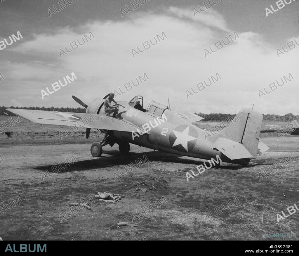 February 2, 1943 - U.S. Marine Corps Grumman F4F Wildcat fighter plane at Henderson Field on Guadalcanal, Solomon Islands. Markings under the cockpit indicate that this plane has been credited with shooting down 19 Japanese aircraft, while being flown by several different pilots.