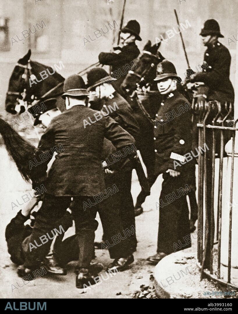 Police arresting a group of hunger marchers in London, 1932. The National Hunger March of September-October 1932 was the largest of a series of marches organised in Britain during the Great Depression to protest against unemployment and hunger in the country. 100,000 people joined the march, which began in Scotland and ended in Hyde Park, where it culminated in a riot.