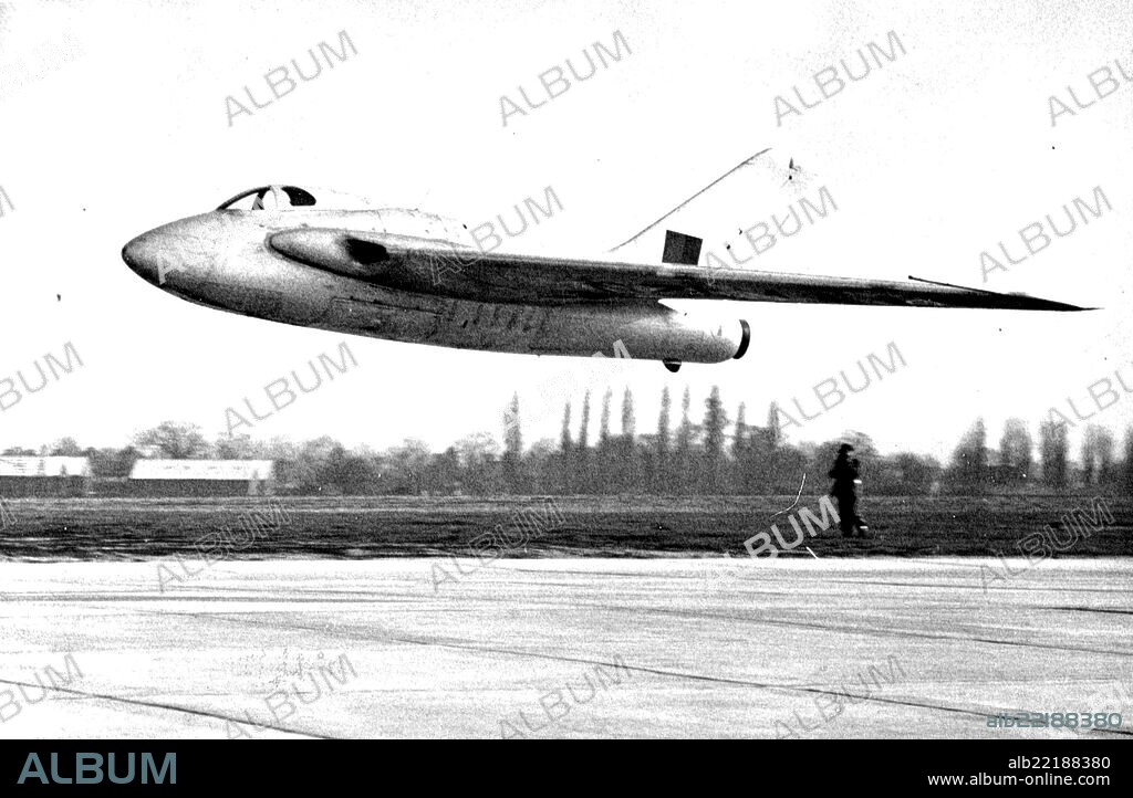 British Jet Plane Establishes New Speed Record -- Mr. John Derry ***** from the cockpit of his De Havilland 108 after his record breaking flight at Hatfield, Hertfordshire.Mr. John Derry, 26 year old test pilot, flying a De Havilland 108 jet aircraft a tail-lese monoplane broke the air speed record for the 100 kilometres closed circuit, with a speed of 605,23 m.p.h. His top speed was 635 m.p.h. record recently set up by Mr.M.J.Lithgow flying a Vickers-Armstrong Supermarine "Attacker", on February 27. climbing. December 4, 1948. (Photo by Sport & General Press Agency Limited).