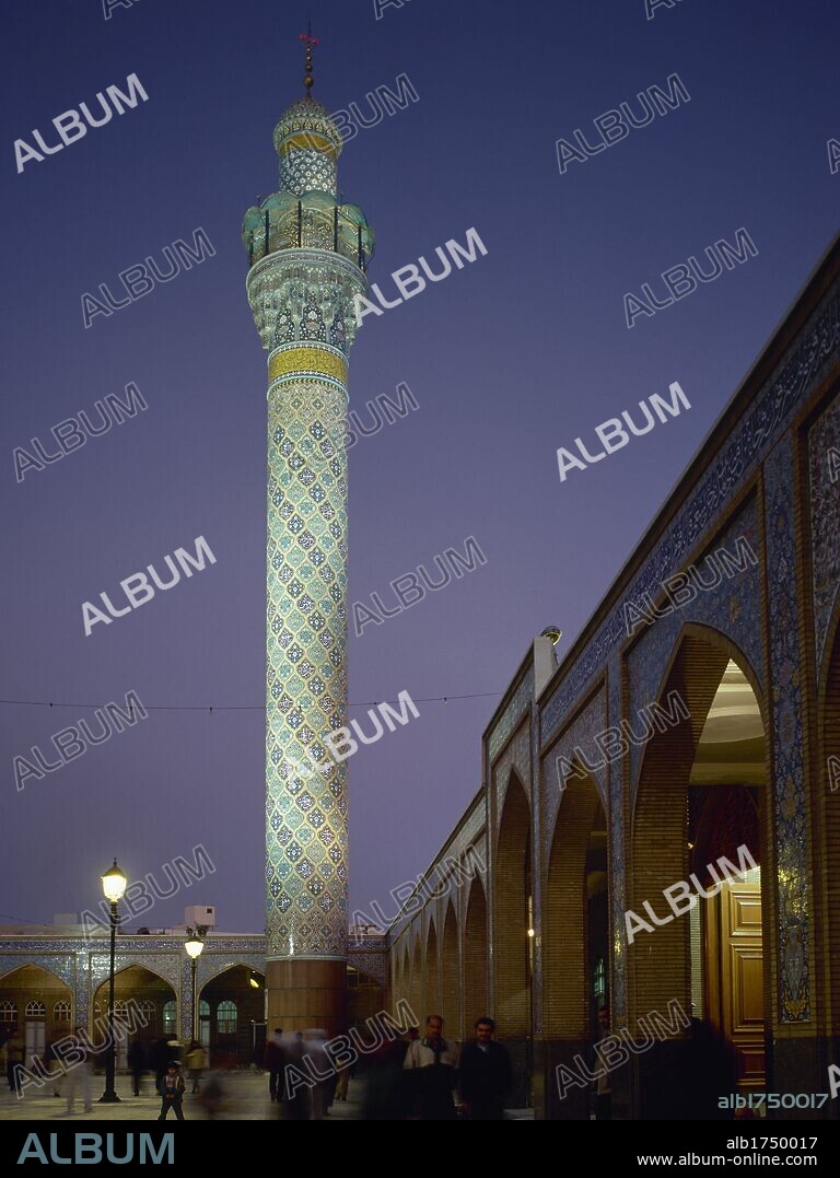 Syria. Suburbs of Damascus. Sayyidah Zaynab Mosque. Shia Islam. It contains the grave of Zainab. The architect was Rida Mourtada. Architectural detail. Night view of one of its minarets.