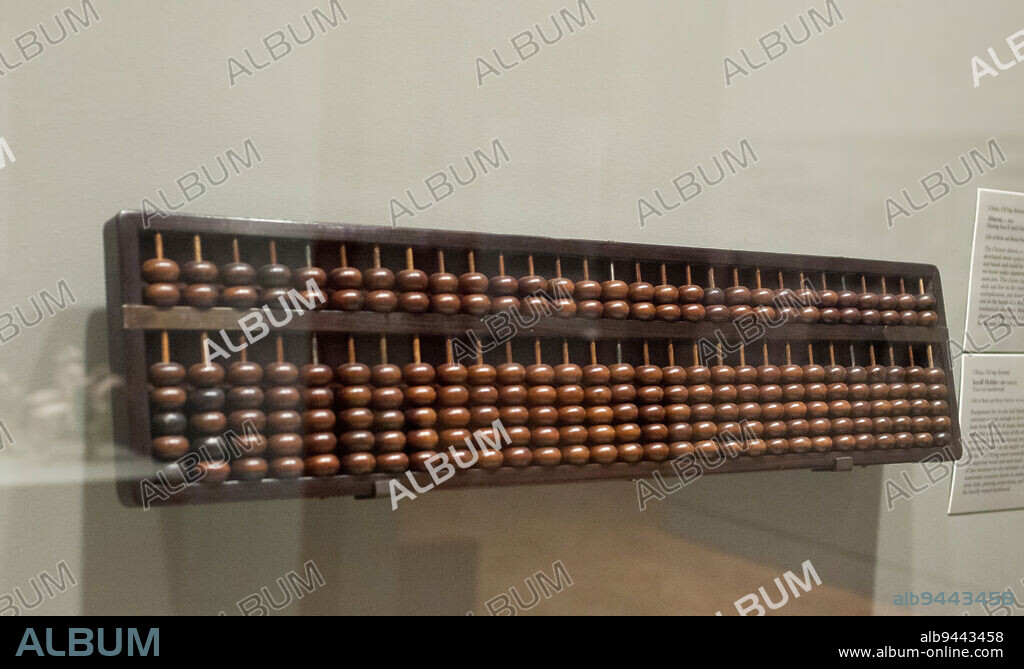 Abacus, c. 1800, 7 9/16 x 32 5/16 x 1 3/8 in. (19.2 x 82.1 x 3.5 cm), Huang-hua-li and t'zu-tan hardwood, China, 18th-19th century, The Chinese abacus, a mechanical counting device, was developed about 5,000 years ago. It was built of wood and beads and could be easily carried. The form of abacus we know today appeared around 1200 a.d. and is called suan-pan. This classic type has two heads on the upper deck and five on the lower. Addition, subtraction, multiplication, and division are possible with the abacus, and in the hands of a skilled operator, it is faster than a mechanical calculator. Made of precious hardwoods, this abacus was likely used in a large, aristocratic household for keeping financial accounts.