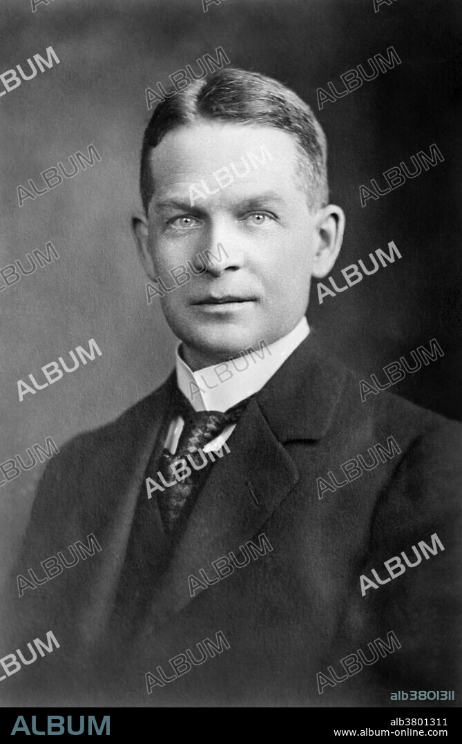 Frederick Soddy (1877-1956) was an English radiochemist and monetary economist. In 1900 he became a demonstrator in chemistry at McGill University in Quebec, where he worked with Ernest Rutherford on radioactivity. When radioactivity was first discovered, no one was sure what the cause was. It needed careful work by Soddy and Rutherford to prove that atomic transmutation was in fact occurring. In 1903, Soddy verified that the decay of radium produced alpha particles composed of positively charged nuclei of helium. From 1904 to 1914, Soddy was a lecturer at the University of Glasgow and while there he showed that uranium decays to radium. It was here also that he showed that a radioactive element may have more than one atomic mass though the chemical properties are identical. He named this concept isotope. He received the 1921 Nobel Prize in chemistry for his research in radioactive decay and particularly for his formulation of the theory of isotopes. He died in 1956 at the age of 79. The lunar crater Soddy is named after him, as is the uranium compound Soddyite.