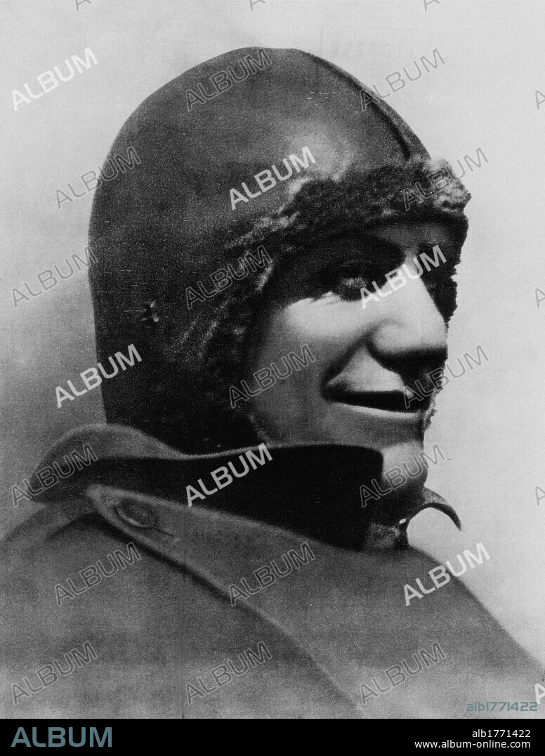 Benito Mussolini wearing a pilot helmet. The Head of the Italian Government Benito Mussolini wearing a leather helmet for fighter pilot. Italy, 1934.