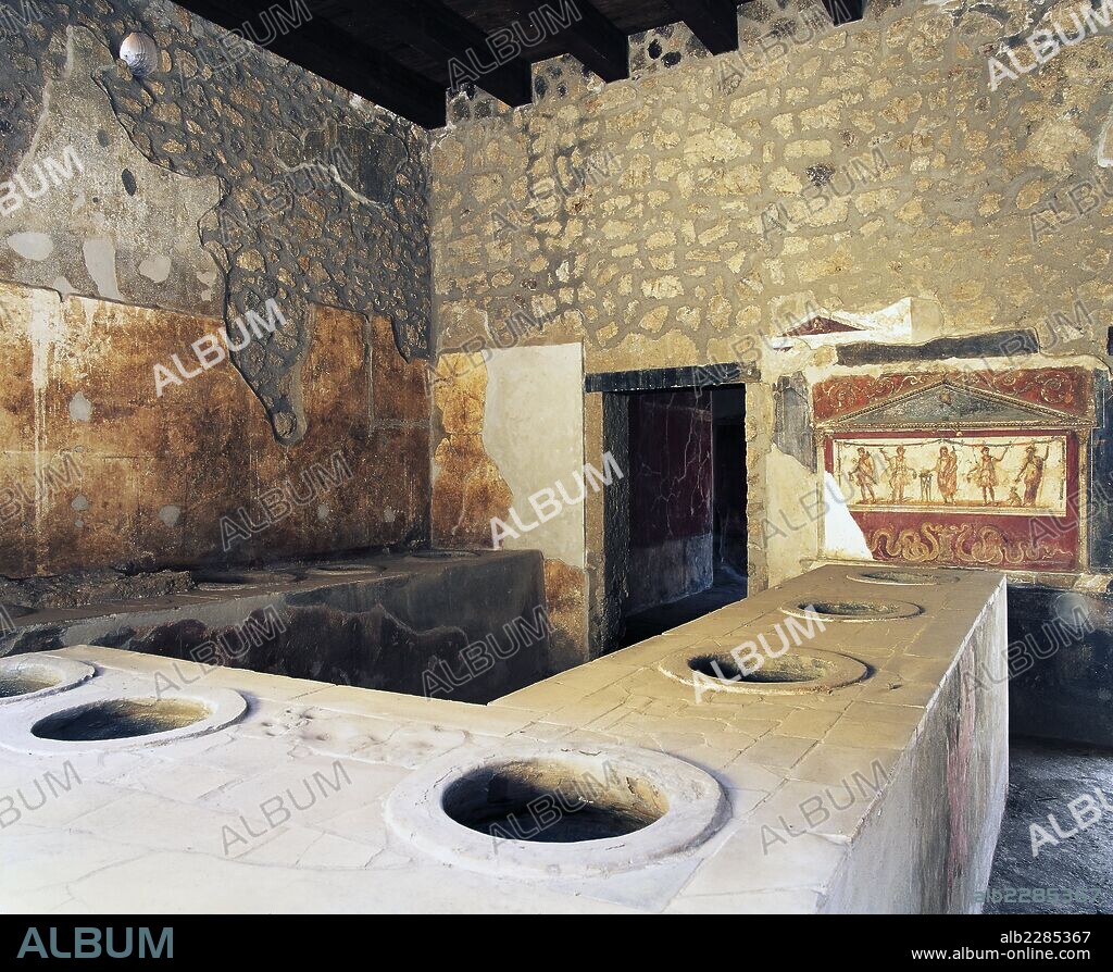 Thermopolium with lararium, Pompeii (Unesco World Heritage List, 1997), Campania, Italy. Roman civilisation, 1st century.