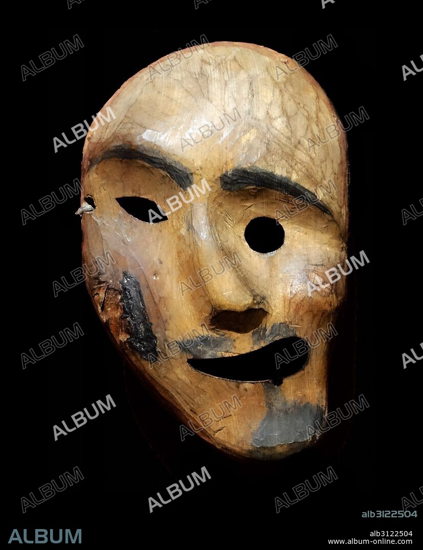 Spirit mask. Used by an Alaskan, Inuit Shaman, this mask would have been worn during ritual dances to bring good health and hunting. Made from hair, copper and painted wood, Alaska, late 1800s.