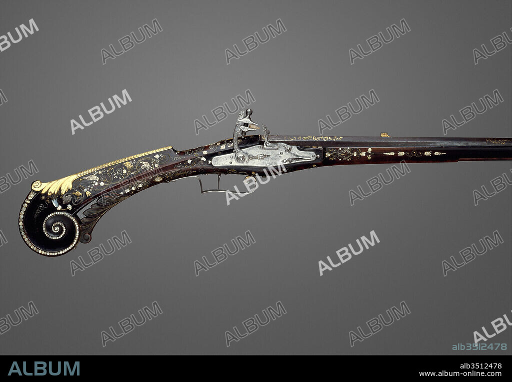 Flintlock Gun of Louis XIII (1601–1643), King of France, ca. 1620, Lisieux, French, Lisieux, Steel, brass, silver, gold, wood (walnut), mother-of-pearl, L. 55 5/16 in. (140.5 cm); Cal. .59 in. (55 mm); L. of barrel 41 in. (104.1 cm); L. of lockplate 6 9/16 in. (16.7 cm); Wt. 5 lb. 11 oz. (2580 g), Firearms-Guns-Flintlock, This fowling piece is one of the earliest firearms equiped with the flintlock of French construction. It was made for Louis XIII (reigned 1610–43) in the workshop directed by Pierre Le Bourgeois' brother, Marin (about 1550–1634), to whom the invention of the flintlock mechanism is traditionally ascribed.
