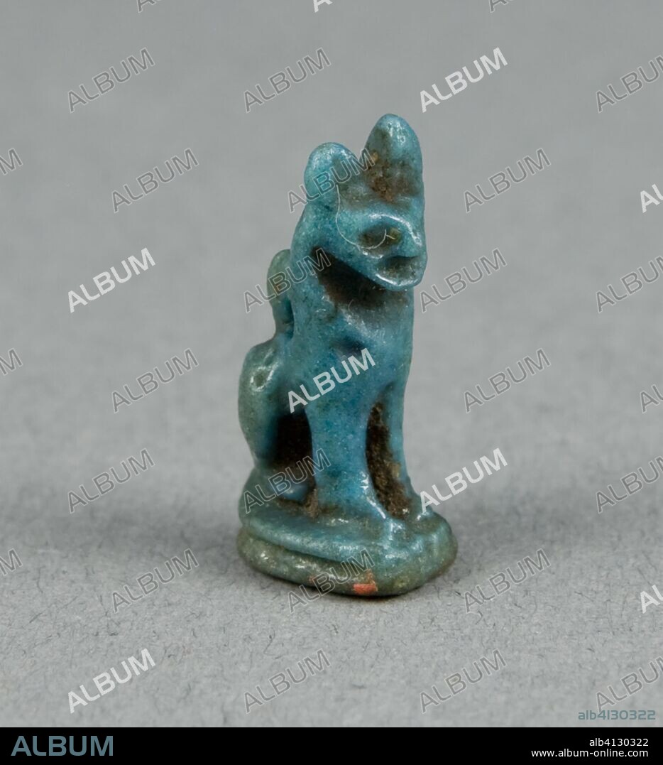 ANCIENT EGYPTIAN. Amulet of the Goddess Bastet as a Seated Cat. Egyptian. Date: 664 BC-30 BC. Dimensions: 1.6 x 0.6 x 1 cm (5/8 x 1/4 x 3/8 in.). Faience. Origin: Egypt.