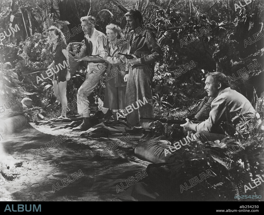 ALAN NAPIER, ALBERT DEKKER, EVELYN ANKERS and LEX BARKER in TARZAN'S MAGIC FOUNTAIN, 1949, directed by LEE SCHOLEM. Copyright RKO.
