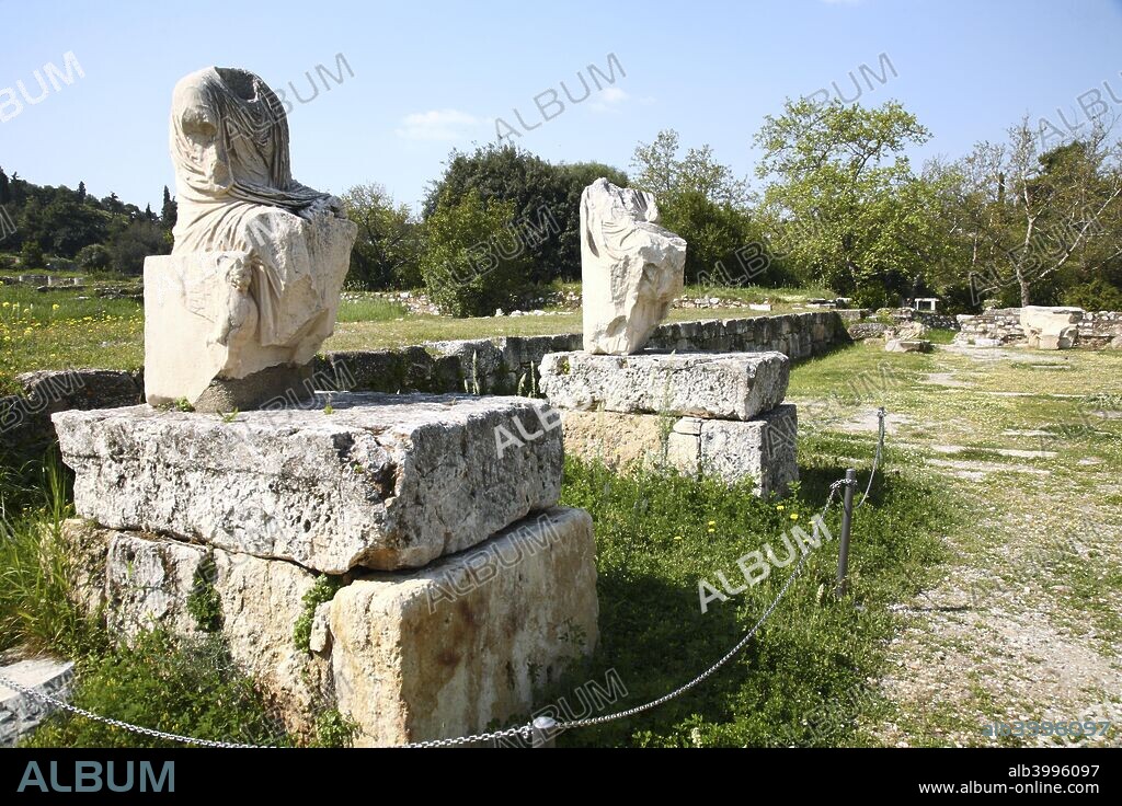 The Odeon of Agrippa in the Greek Agora of Athens, Greece. The Odeon of Agrippa was a large concert hall located in the centre of the Ancient Agora of Athens. It was built about 15 BC, occupying what had previously been open space in the centre of the agora. It was a gift to the people of Athens by Marcus Vipsanius Agrippa, a Roman statesman and general. The two-storey auditorium seated around 1,000 spectators and was equipped with a raised stage and marble-paved orchestra. On three sides it was surrounded by a subterranean cryptoporticus with stoae above. The building was decorated externally with Corinthian pilasters. The main entrance for spectators was originally on the south side of the building, with access from the terrace of the Middle Stoa. The north facade only had a small portico to give access to the stage.