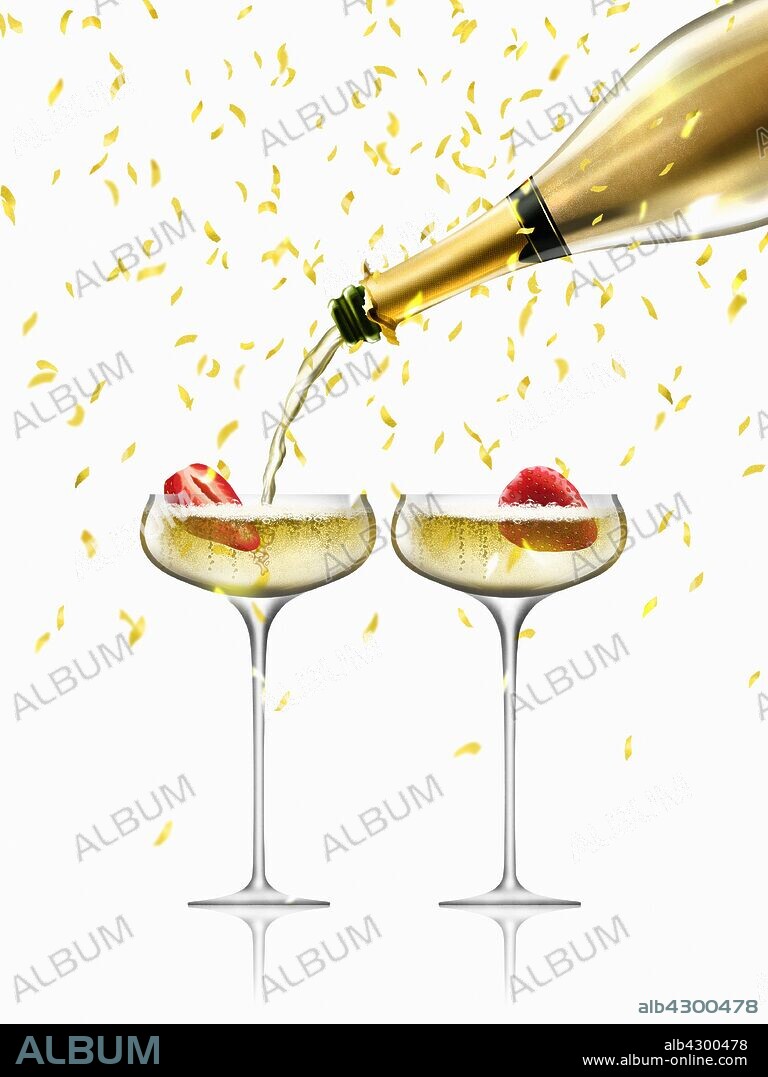 Confetti falling on gold champagne bottle filling two champagne coupes.