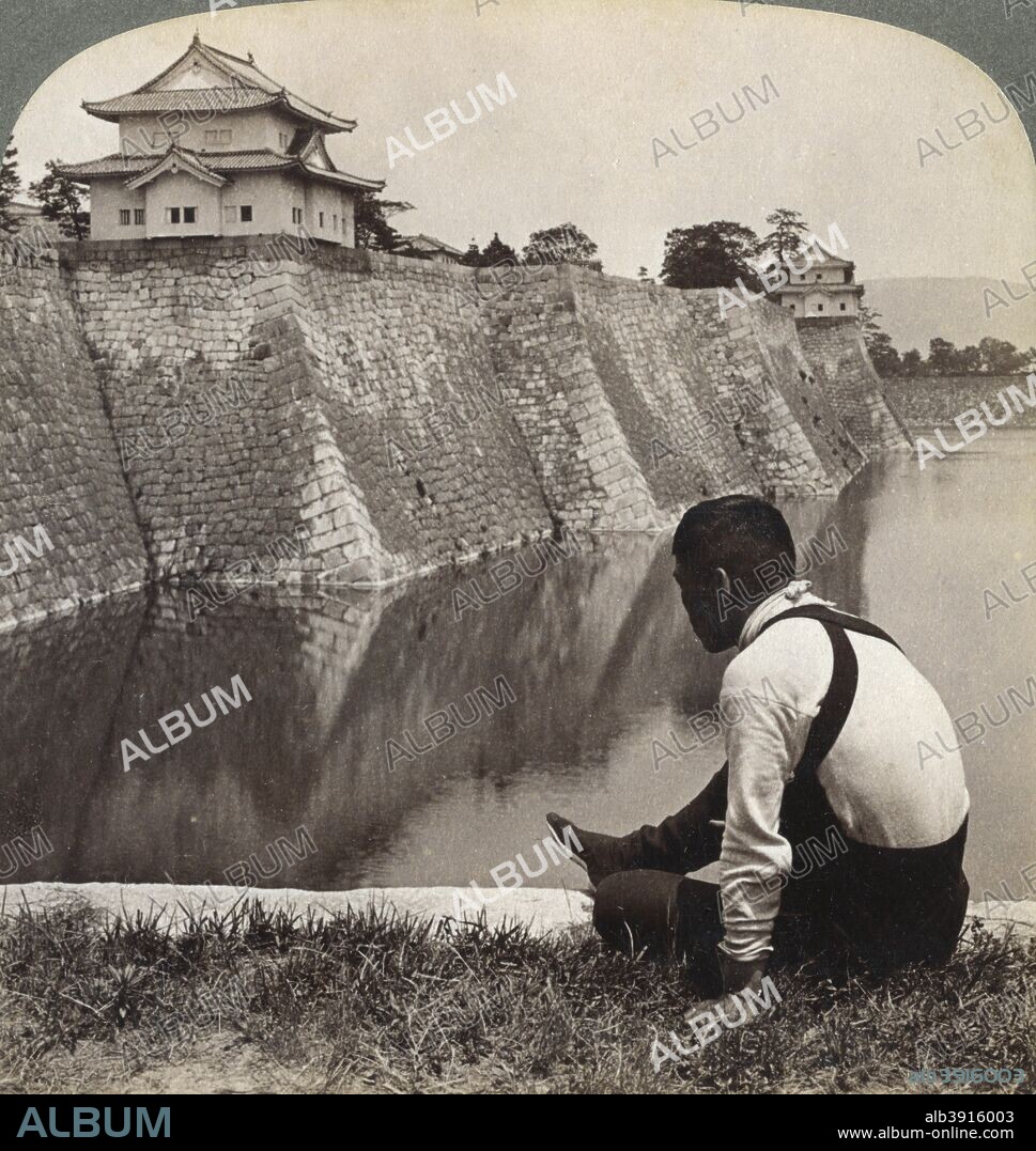 Feudal castle of the proud Shoguns, Osaka, Japan, 1904. One of the most famous castles in Japan, Osaka Castle was built in the late 16th century by the Toyotomi clan. In 1615 it fell to the army of Tokugawa Ieyasu, who founded the Tokugawa Shogunate that ruled Japan until 1868. Tokugawa Ieyasu's son and heir, Tokugawa Hidetada, rebuilt and stregthened the castle in the 1620s. Stereoscopic card. Detail.