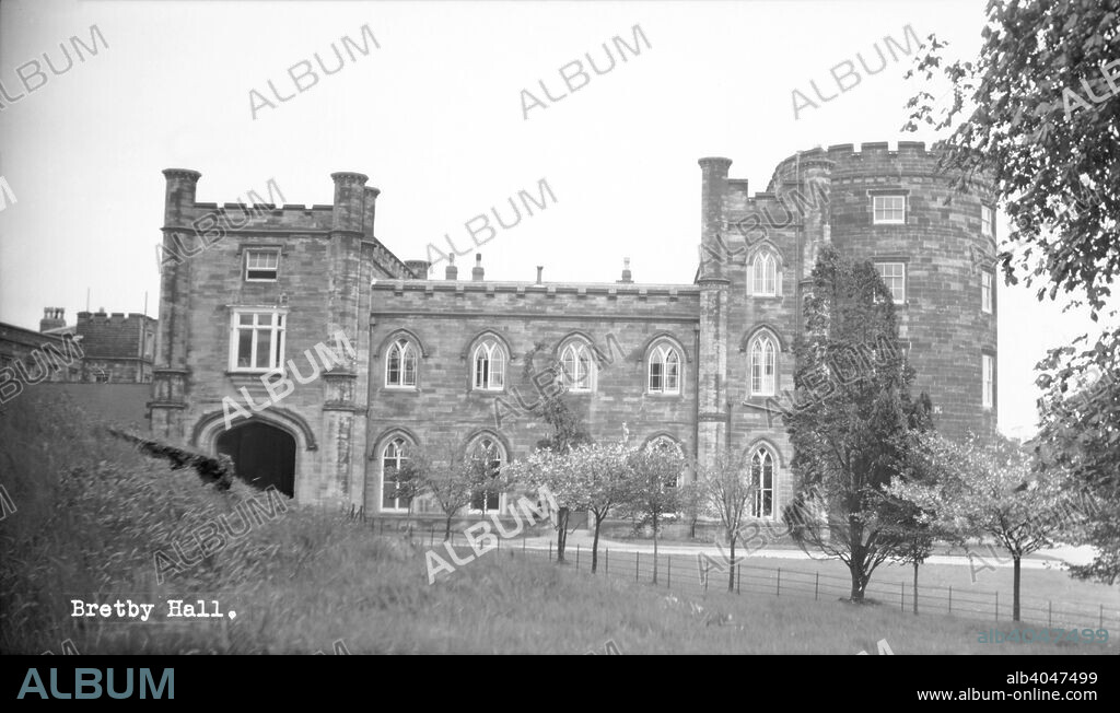 Bretby Hall, Bretby, Derbyshire, mid 20th century. The castellated mansion was built in 1813 for the Earl of Chesterfield on the site of his family's 17th century manor house. The house was left unfinished at the Earl's death in 1815. The building was purchased in 1926 by the Derbyshire County Council for use as a hospital and remained an orthopaedic hospital until the 1990s, the hall and grounds then being sold to developers to provide private residential units.