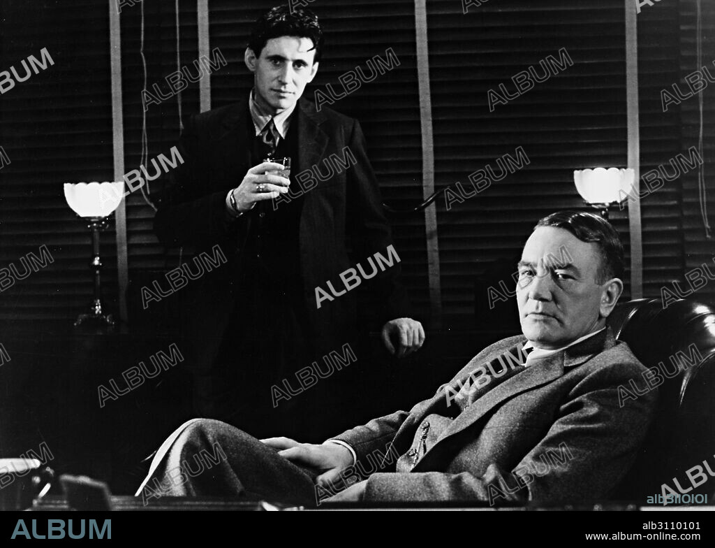 ALBERT FINNEY and GABRIEL BYRNE in MILLER'S CROSSING, 1990, directed by ETHAN COEN and JOEL COEN. Copyright 20TH CENTURY FOX.