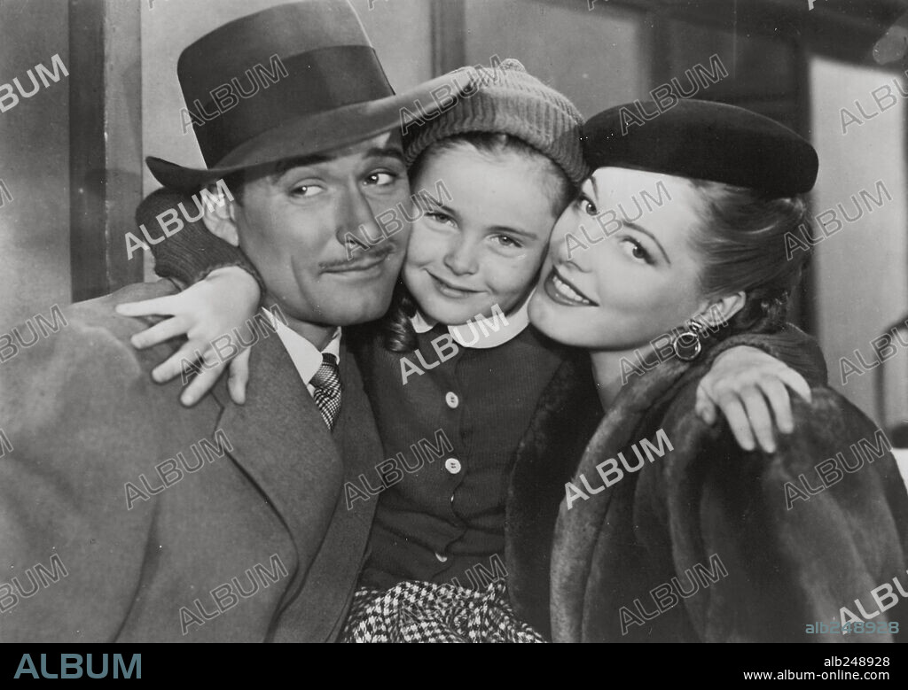 Eleanor Jane Parker y Errol Flynn. ELEANOR PARKER y ERROL FLYNN en NUNCA TE ALEJES DE MI, 1946 (NEVER SAY GOODBYE), dirigida por JAMES V. KERN. Copyright WARNER BROTHERS.