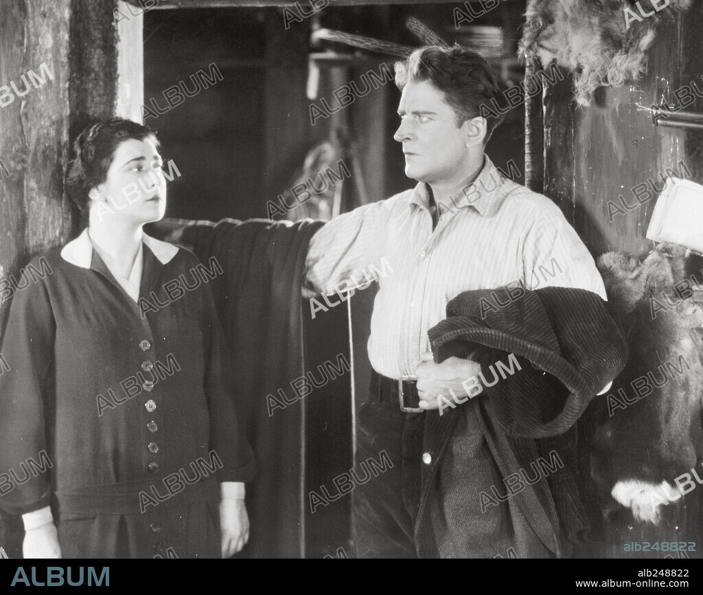 MALCOLM KEEN and NITA NALDI in FEAR O' GOD, 1926 (THE MOUNTAIN EAGLE), directed by ALFRED HITCHCOCK. Copyright GAINSBOROUGH FILMS.