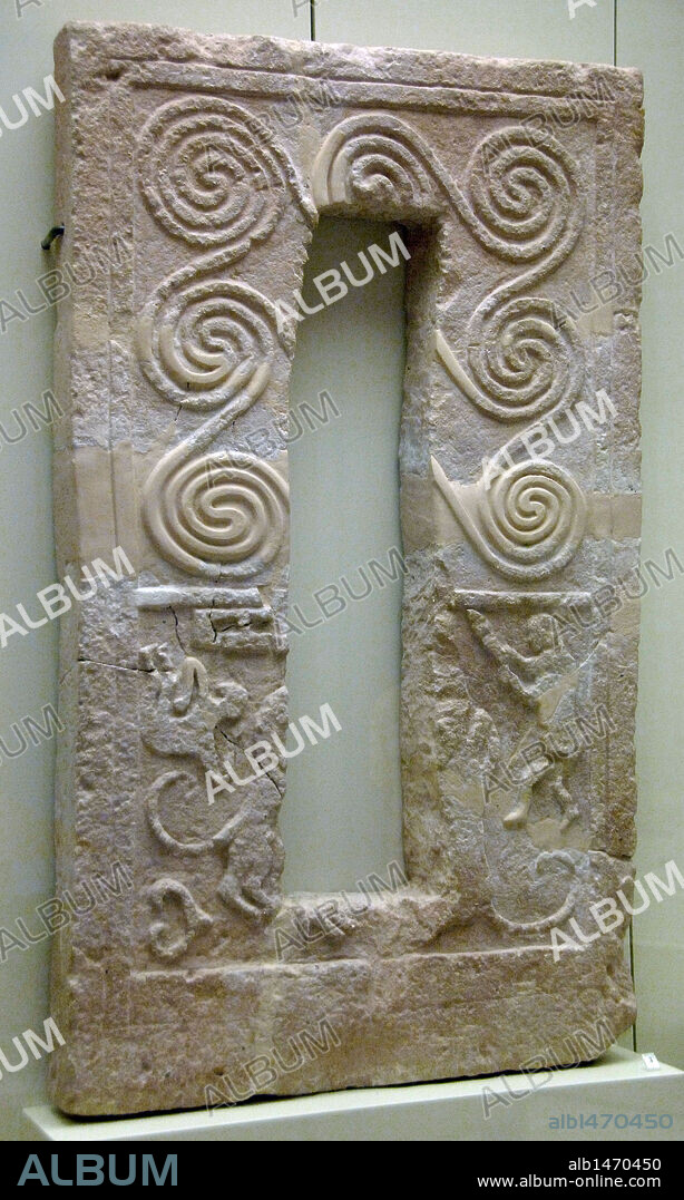 Mycenaen Art. Late Helladic I period. Greece. Funerary stele decorated in geometric style on the top and fight scene with animals on the bottom. Dated between 1600-1500 b.C. Archaeological Museum of the Acropolis. Mycenae.