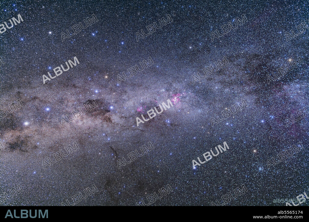 The southern Milky Way from Vela (at right) to Centaurus (at left), with the False Cross at left, the true Southern Cross at right of centre, and Alpha and Beta Centauri at left. The star cluster at lower right is NGC 2516. Omega Centauri is at upper left. The Coalsack is left of the Southern Cross.