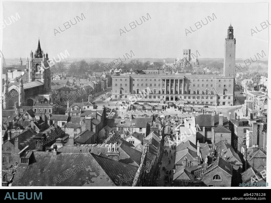 EDWARD CHARLES LE GRICE. Market Place, Norwich, Norfolk, 1941-1950. A view looking west from the Castle Museum battlements towards St Peter Mancroft Church and City Hall. The City Hall was designed in Art Deco style by Charles Holloway James and Stephen Rowland Pierce and completed in 1938. St Peter Mancroft dates from the mid 15th century.