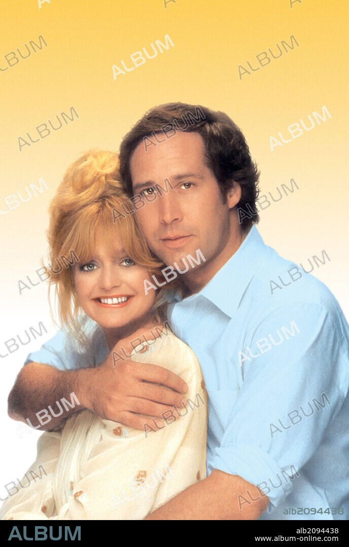CHEVY CHASE and GOLDIE HAWN in SEEMS LIKE OLD TIMES, 1980, directed by JAY SANDRICH. Copyright RAY STARK/COLUMBIA.