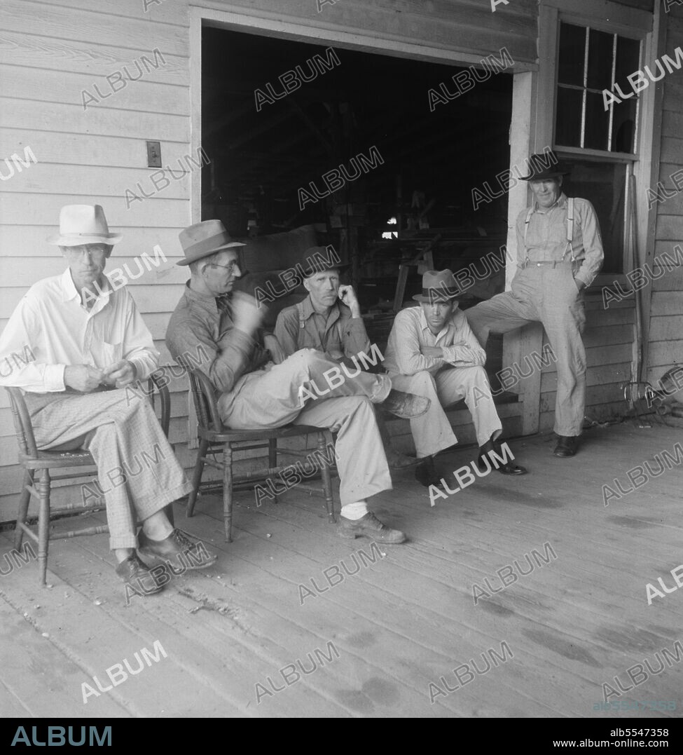 DOROTHEA LANGE. South Carolina. Livery stable gang talking politics in the country of Senator "Cotton Ed" Smith. [Ellison DuRant Smith represented South Carolina in the US Senate from 1909 until 1944. He held racist and segregationist views, and advocated white supremacy.].