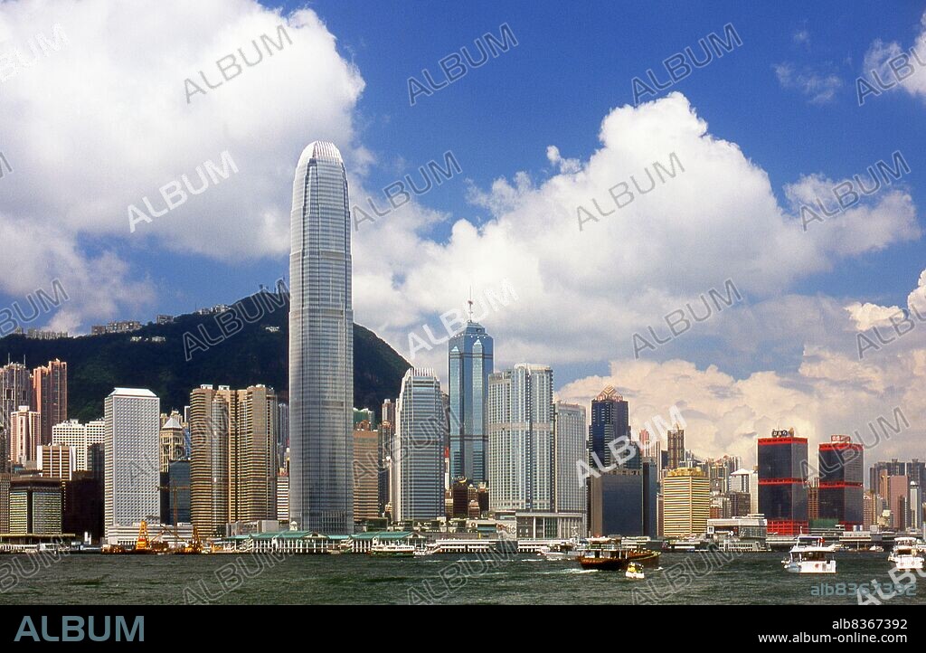 China: Hong Kong cityscape including the Central Plaza Building and the Two International Finance Centre. Looking towards Hong Kong Island from Kowloon.<br/><br/>. Originally a sparsely populated area of farming and fishing villages, Hong Kong has become one of the world's most significant financial centres and commercial ports. It is the world's tenth-largest exporter and ninth-largest importer.<br/><br/>. Hong Kong became a colony of the British Empire after the Qing Empire ceded Hong Kong Island at the end of the First Opium War in 1842.