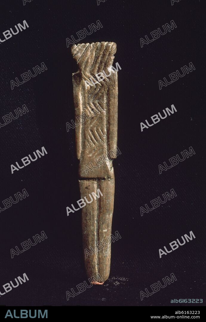 IDOLO ANTROPOMORFO DE HUESO O DIVINIDAD- PROCEDENTE DE VALENCINA DE LA CONCEPCION(SEVILLA)2100-1800 AC TRANSICION DEL CALCOLITO A LA EDAD DE BRONCE.