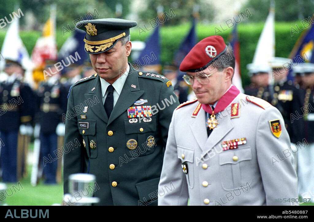 U.S. Army Gen. Colin Powell (left), Chairman of the Joint Chiefs of Staff, escorts Gen. Klaus Naumann, German Inspector General of the Bundeswehr (Unified Armed Forces of Germany).