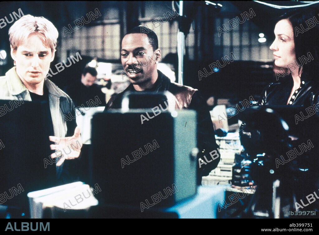 EDDIE MURPHY, FAMKE JANSSEN and OWEN WILSON in I SPY, 2002, directed by BETTY THOMAS. Copyright COLUMBIA PICTURES / McBROOM, BRUCE.