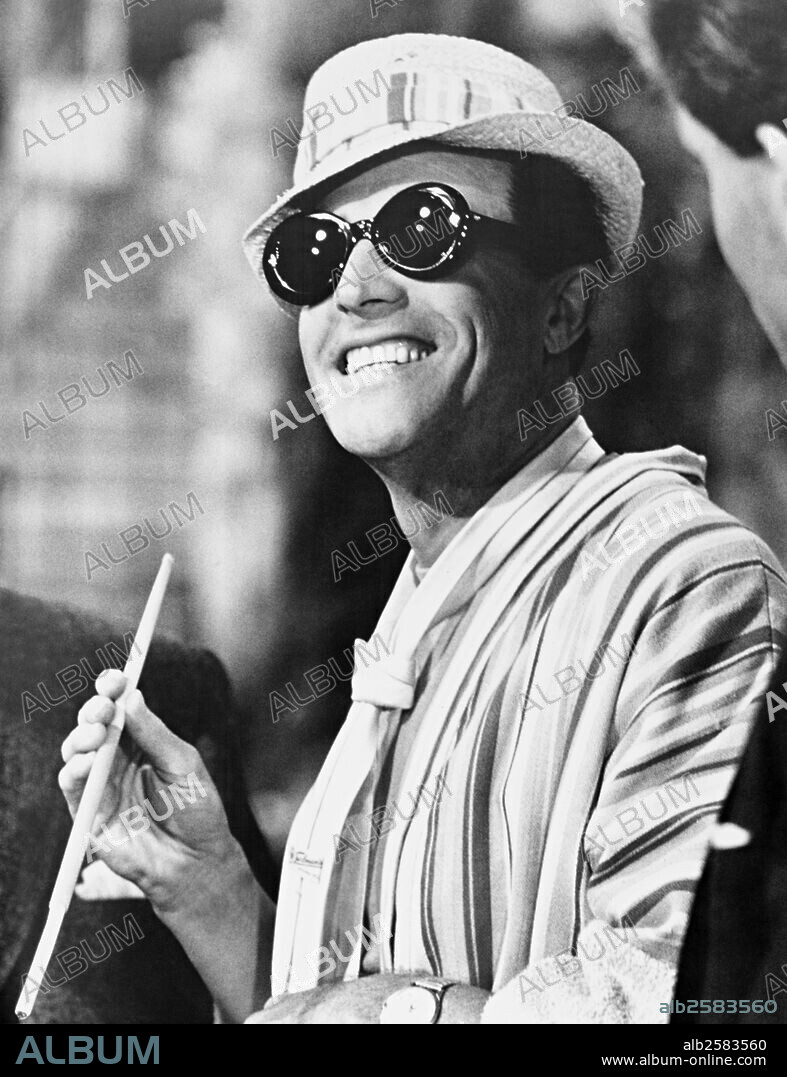 GENE KELLY in WHAT A WAY TO GO, 1964, directed by J. LEE THOMPSON. Copyright 20TH CENTURY FOX.