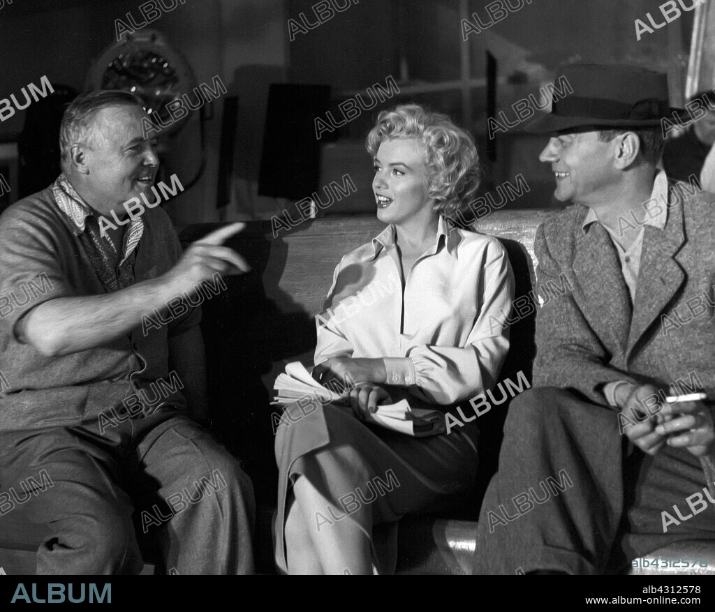 NORMA JEAN BAKER, JOSEPH COTTEN and HENRY HATHAWAY. HENRY HATHAWAY, JOSEPH COTTEN and MARILYN MONROE in NIAGARA, 1953, directed by HENRY HATHAWAY. Copyright 20TH CENTURY FOX.