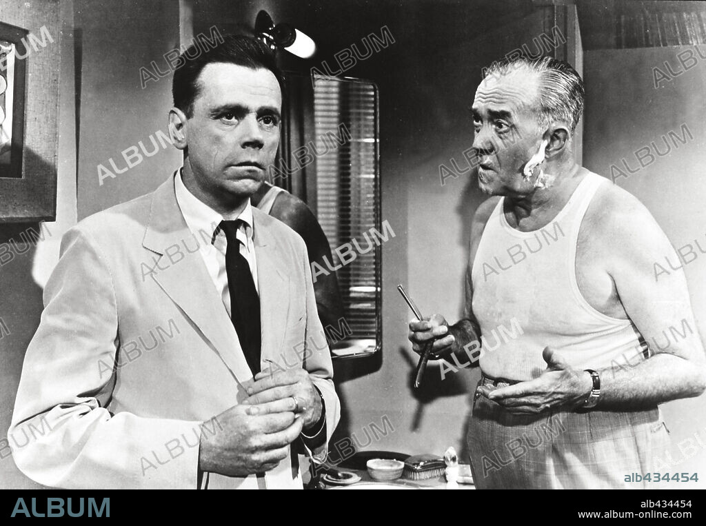DONALD MacBRIDE and TOM EWELL in THE SEVEN YEAR ITCH, 1955, directed by BILLY WILDER. Copyright 20TH CENTURY FOX.