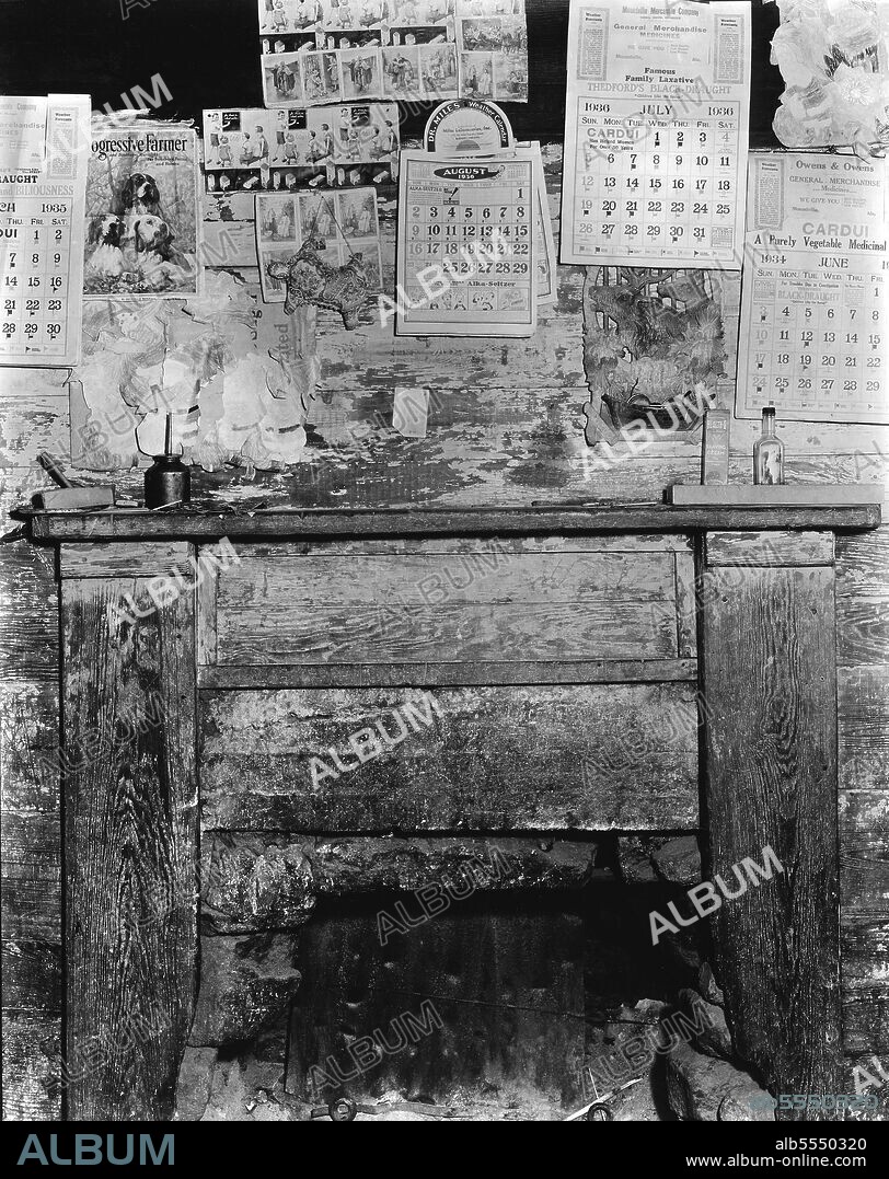 WALKER EVANS. Fireplace in Frank Tengle's home. Hale County, Alabama. [Advertisements for Progressive Farmer and Southern Ruralist magazine; 666 remedy 'for head or chest colds'; Alka-Seltzer; Thedford's Black-Draught 'Famous Family Laxative' - "Children Like the Syrup"; cards showing biblical scenes].