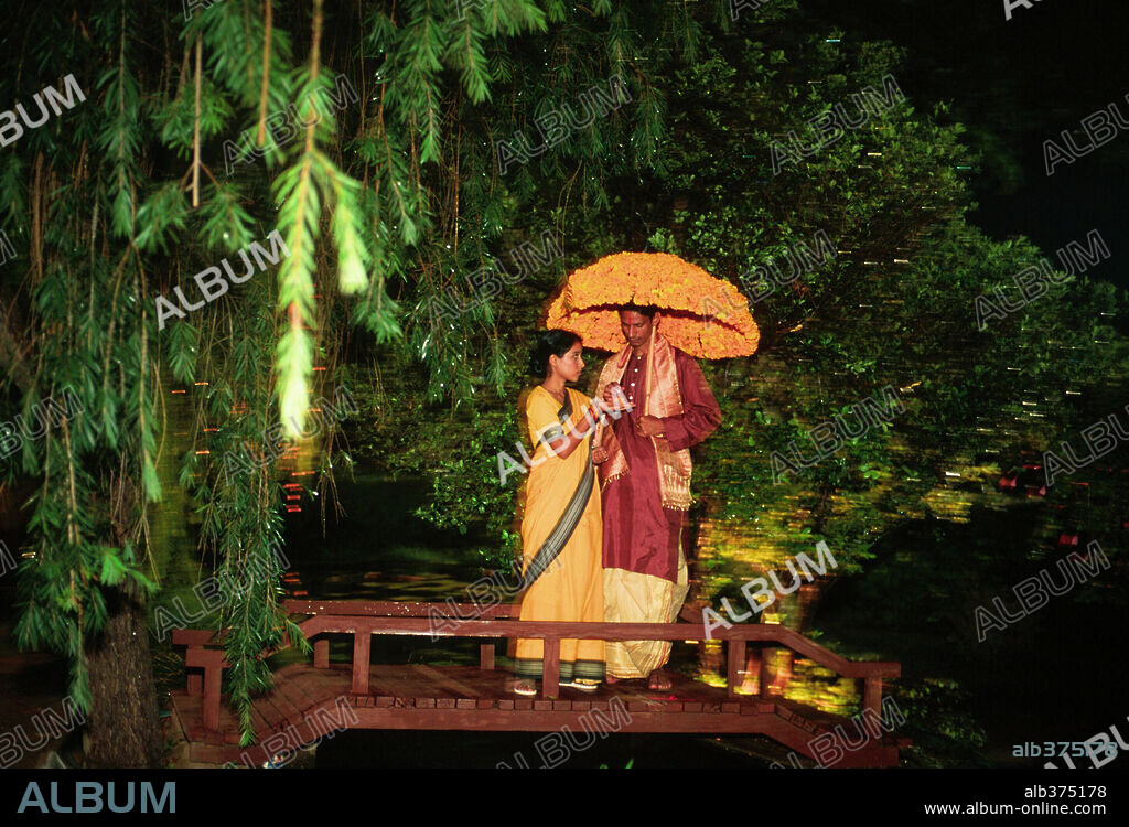 TILOTAMA SHOME and VIJAY RAAZ in MONSOON WEDDING, 2001, directed by MIRA NAIR. Copyright MIRABAI FILMS.