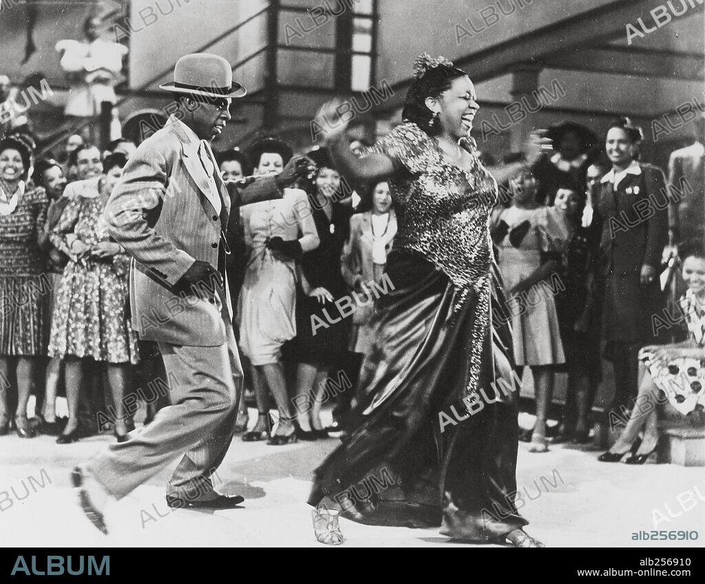 EDDIE "ROCHESTER" ANDERSON and ETHEL WATERS in CABIN IN THE SKY, 1943, directed by BUSBY BERKELEY and VINCENTE MINNELLI. Copyright M.G.M.