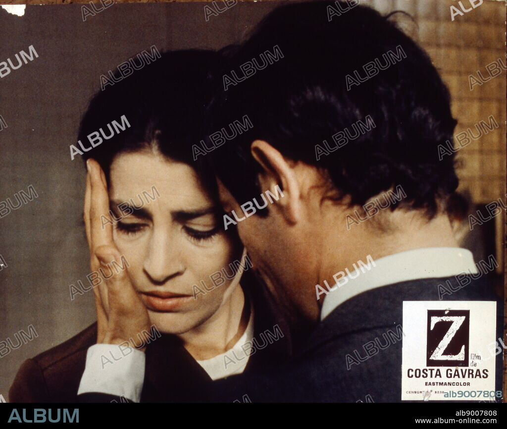 Film Still, from the fast-paced thriller Z (1969) by Costa-Gavras. Konstantinos Gavras, born 12 February 1933; Greek-French film director and producer, who lives and works in France. He is known for films with overt political themes, most famously the fast-paced thriller Z (1969); Algerian-French epic political thriller film directed by Costa-Gavras, with a screenplay by Gavras and Jorge Semprun, based on the 1966 novel of the same name by Vassilis Vassilikos. The film presents a thinly fictionalized account of the events surrounding the assassination of democratic Greek politician Grigoris Lambrakis in 1963.