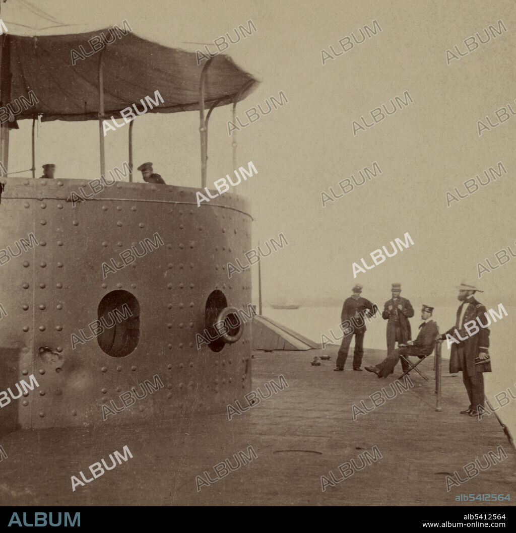 Deck and turret of USS Monitor. USS Monitor was an iron-hulled steam-powered ironclad warship built for the Union Navy during the American Civil War, the first such ship commissioned by the Navy. The unique design of the ship, distinguished by its revolving turret which was designed by American inventor Theodore Timby, was quickly duplicated and established the monitor class and type of armored steam-powered warship built for the American Navy in the next several decades. The remainder of the ship was designed by the Swedish-born engineer and inventor John Ericsson. Cropped stereograph by James F. Gibson, July 9, 1862 (cropped and cleaned).