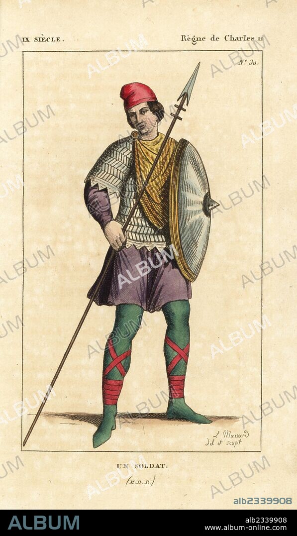 French soldier, 9th century. He wears a Phrygian cap, chlamys, short chainmail armour over a tunic, stockings and shoes laced to the calf. He carries a lance and buckler (shield). Handcoloured copperplate drawn and engraved by Leopold Massard from "French Costumes from King Clovis to Our Days," Massard, Mifliez, Paris, 1834.